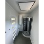 Conteneur habitable 6,00 x 3,00 m avec kitchenette, WC et douche